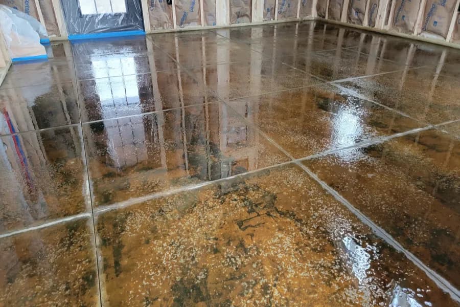 Variegated stained concrete floor for a Saugatuck MI cottage interior