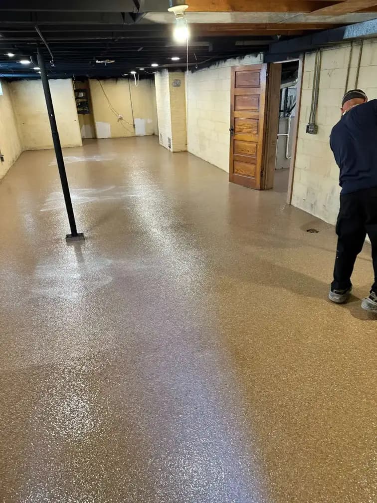 Basement moisture barrier epoxy floor installed near Zeeland Michigan
