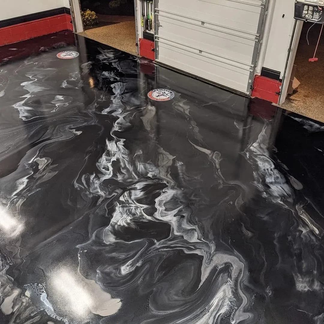 Finished flake garage floor coating by High Caliber Concrete Coatings