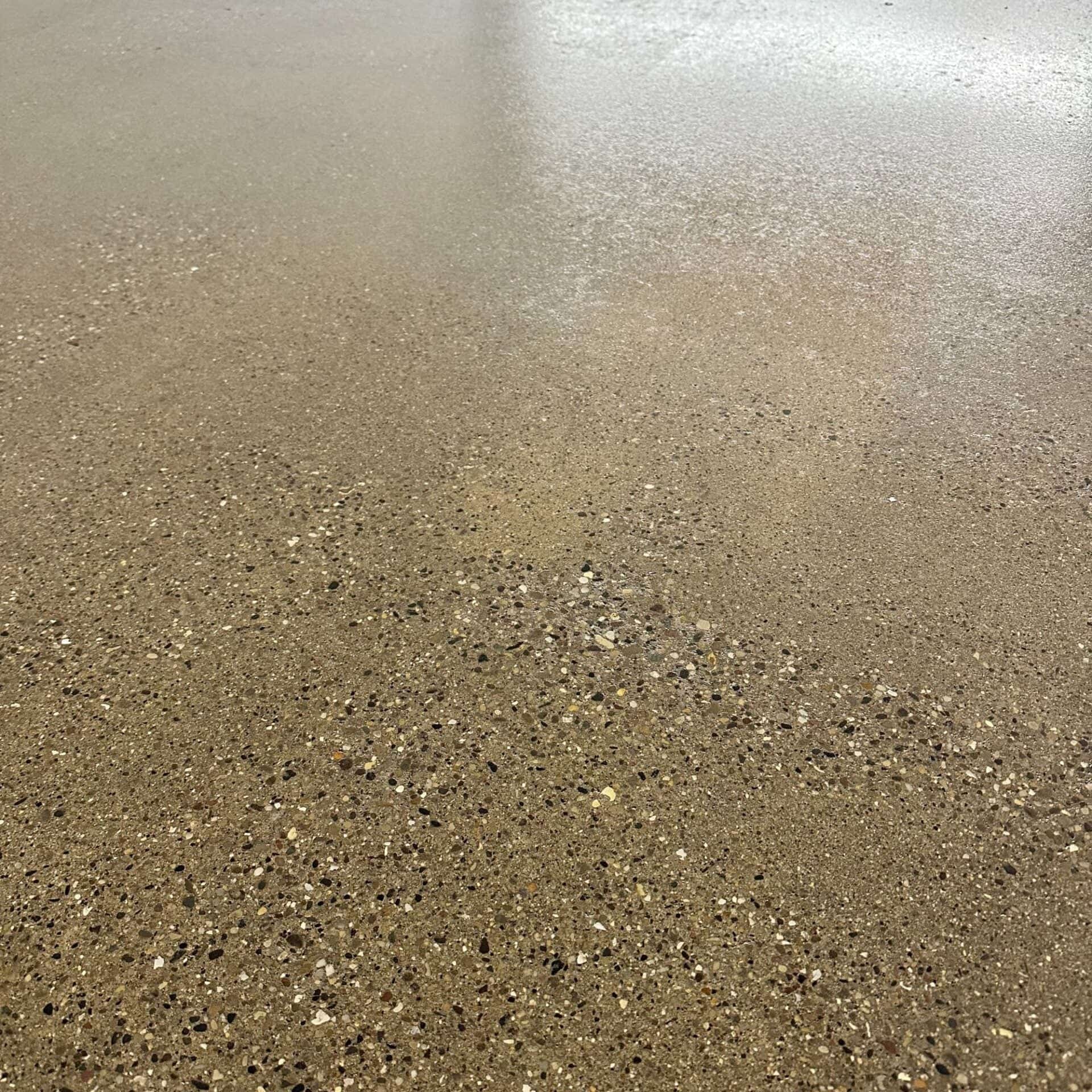 Finished sealed concrete surface with a visible natural texture
