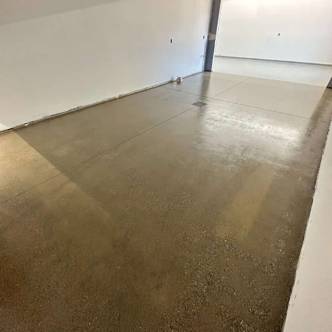 Protective sealer being applied to a concrete surface