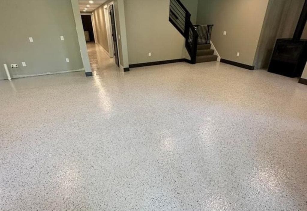 Finished basement epoxy floor coating serving Comstock Park Michigan