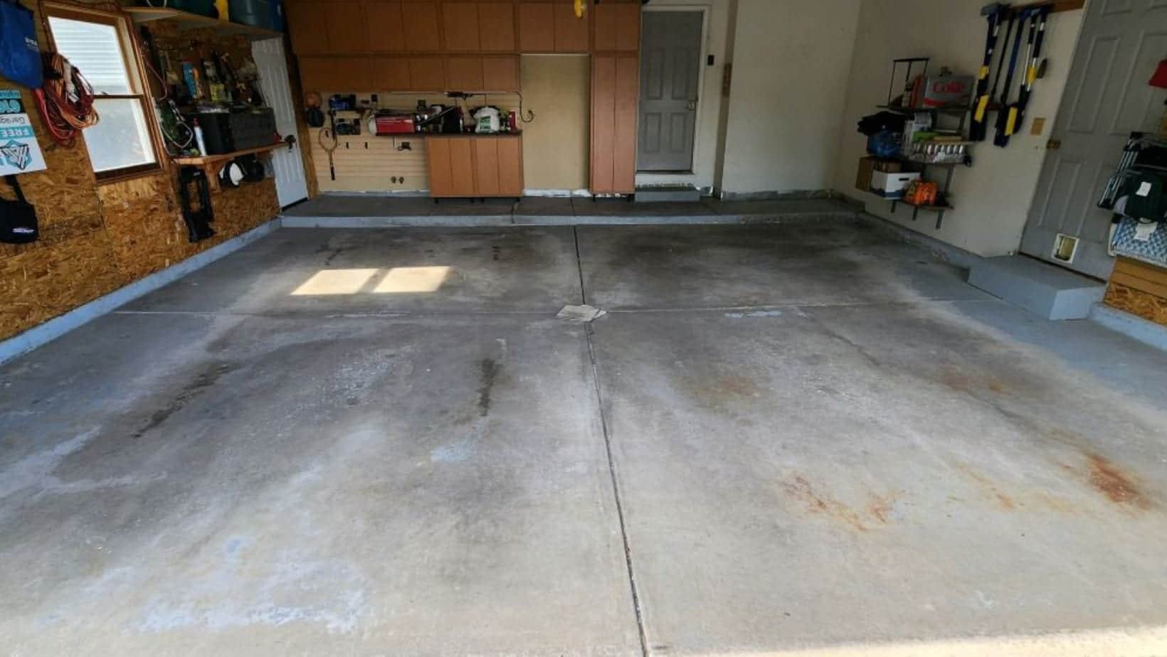 Worn concrete floor before a coating project