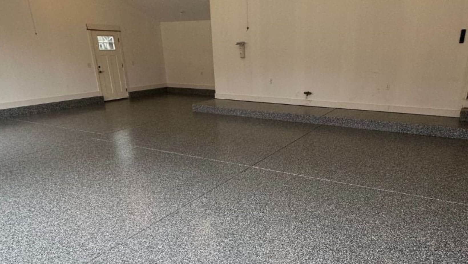 Finished flake coating in a garage recreation space