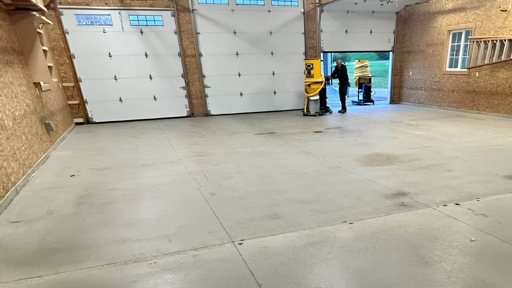 Rough concrete floor in a large work space