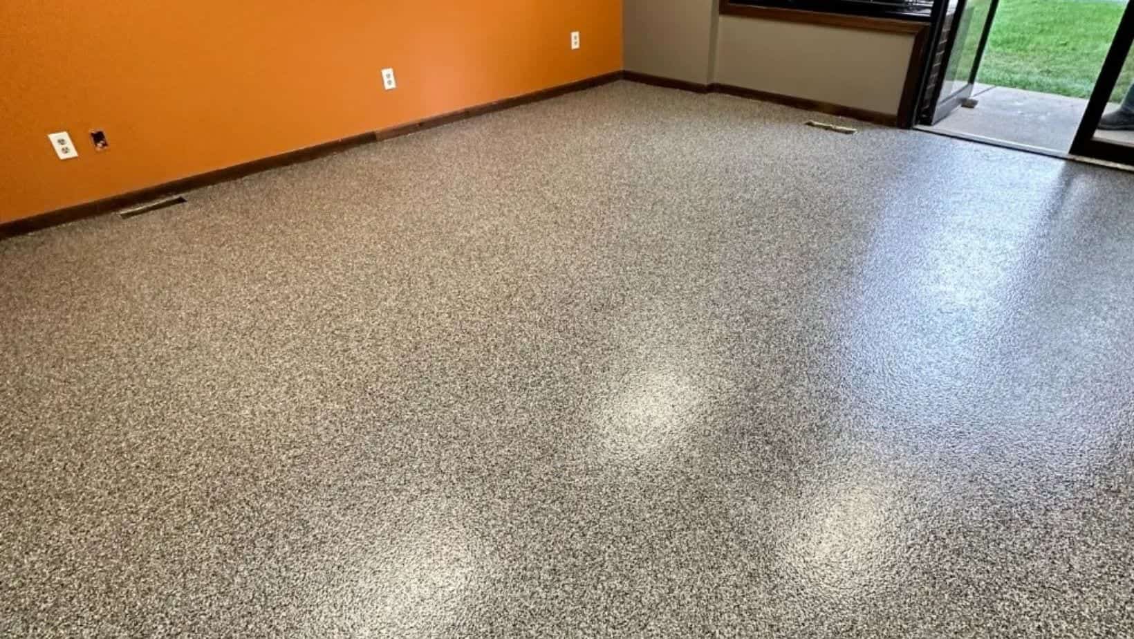 Tan flake garage floor coating completed in Grandville Michigan